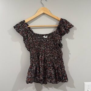 Black floral preplum top